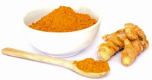 Turmeric in Bowl and Spoon